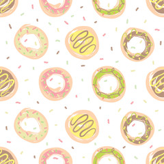 Seamless pattern with baking. Hand drawn sweet donuts with sprinkles on a transparent background.
