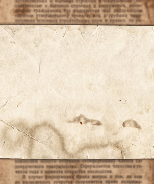 Vintage paper on old newspaper texture background