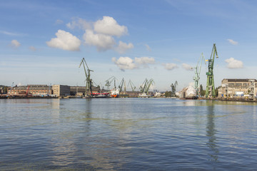 Fototapeta na wymiar Harbor cranes in Gdansk. Poland