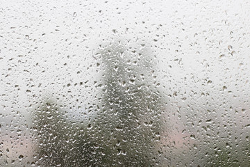 Raindrops on the misted window