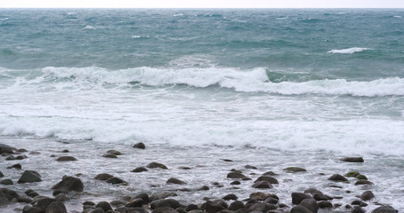 Sea wave stony beach