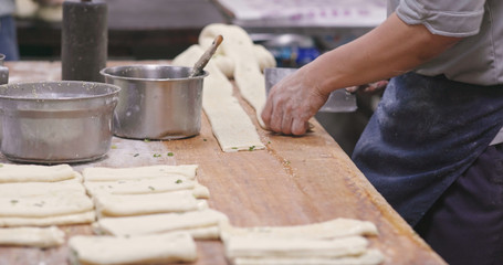 Chef making grill sesame bread in restaurant