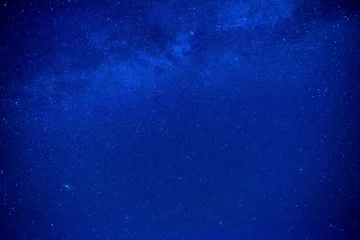 Poster Dark blue night sky with many stars, galaxy background © Pavlo Vakhrushev