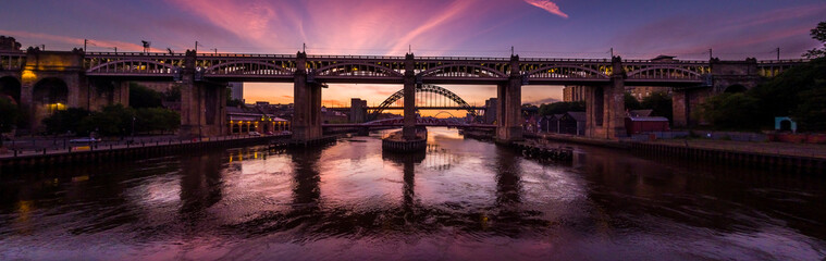 Obraz na płótnie Canvas The River Tyne Bridges at Sunrise