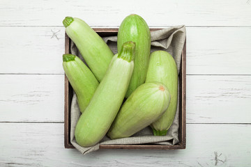 Bright green zucchini, agriculture squash. Courgette close up.