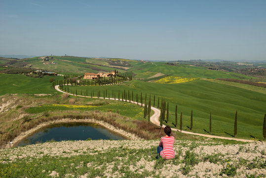 Woman is relaxing in Tuscany