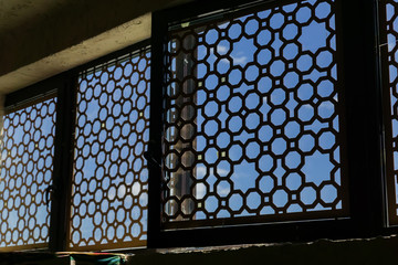 windows with orient ornament made of metal, from the inside