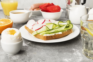 Various healthy breakfast on gray background