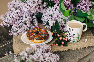 Cup of tea,  flowers, on dark wooden background
