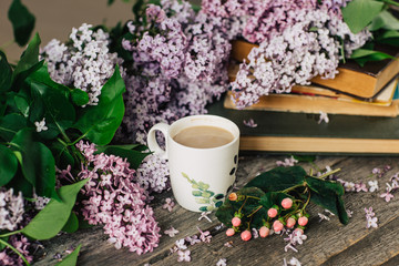 Cup of tea,  flowers, on dark wooden background