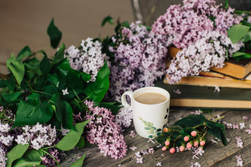 Cup of tea,  flowers, on dark wooden background
