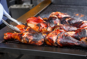 Turkey Legs Grilling at an Outdoor Event
