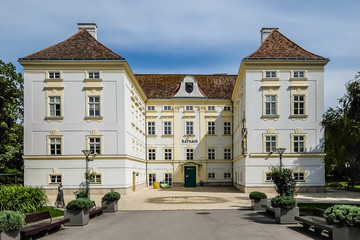 Fototapeta na wymiar Bad Voslau, Austria. View of Bad Voslau (Bad Vöslau or Bad Voeslau) town hall (Rathaus).