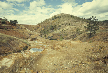 Land of orange color and red waters produced by copper ore from the Zaranda mines, located between Riotinto and Nerva in Andalucia, Spain