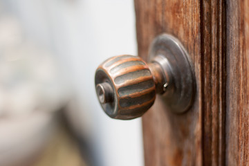Obraz premium door knob with wood door