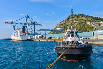 Tug boat with towing rope