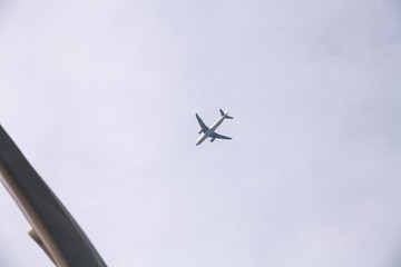 Passenger Airplane flying under the sky