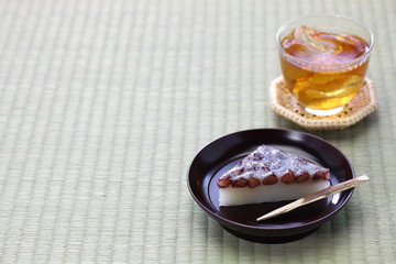 japanese traditional sweet dessert served with barley tea, wagashi and mugicha
