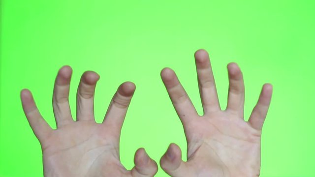 Scratch hands close-up. Chroma key background. Green Screen. Isolated