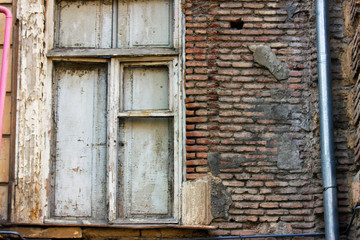 Old Tbilisi architecture, window and exterior decor in summer day