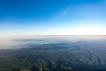 Aerial View of Bali From Top of Mount Agung Volcano. Hiking Down to the Earth, Bali, Indonesia. © Pnnchen