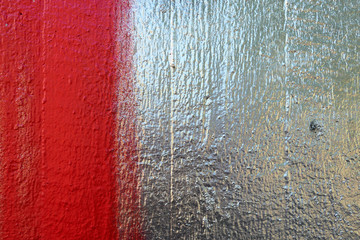 graffiti texture on wooden material in silver red. backdrop