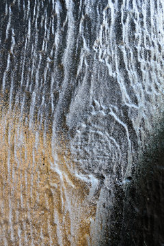 graffiti texture on wooden material in silver black. backdrop