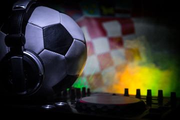 Soccer 2018 club party concept. Close up view of dj deck with selective focus. Useful as club poster.