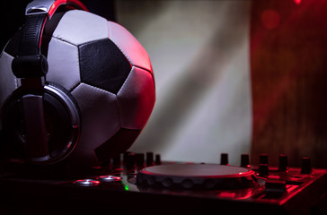 Soccer 2018 club party concept. Close up view of dj deck with selective focus. Useful as club...