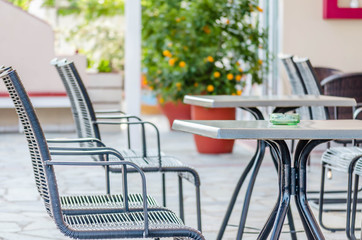 Chairs in the garden restaurant in Leptokaria, Greece 