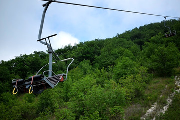Gelendzhik, Russia - June 27, 2018: Cableway in Safari park leading to the top of the Markotkh ridge