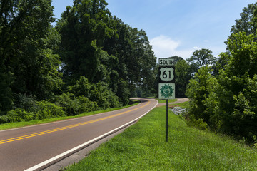 A Great River Road Sign along the US Route 61 near the city of Vicksburg, in the State of Mississippi; Concept for travel in America and road trip in America.