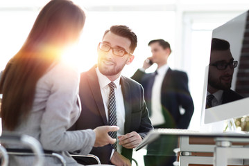 Confident man talking to his interviewer during a job interview
