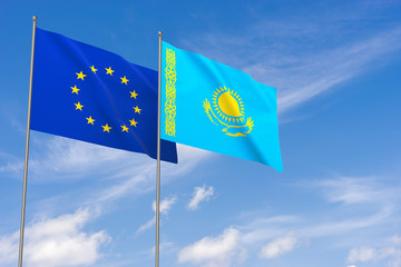 European Union and Kazakhstan flags over blue sky background.