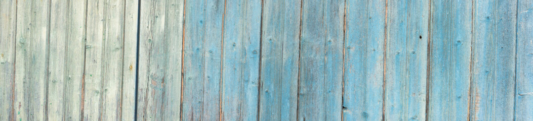 Old wood panorama of light blue weathered wooden planks