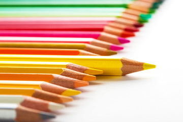 leadership concept with one pencil standing out of crowd of othe
