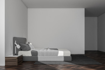 Minimalistic white bedroom interior side view