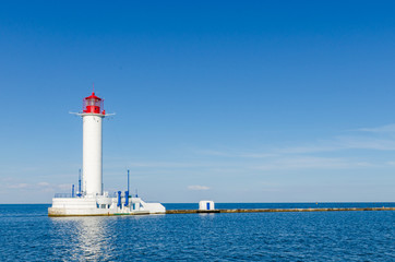Fototapeta na wymiar Seascape with lighthouse in the Odesa port