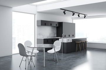 Gray loft kitchen and dining room corner