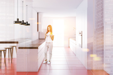 Fototapeta na wymiar Woman in a modern kitchen