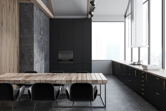 Black, concrete, wooden panoramic kitchen interior