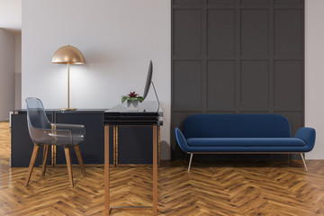 Blue couch in a home office interior