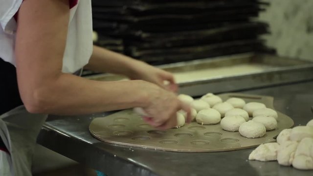 Cooking buns at a large bakery. 