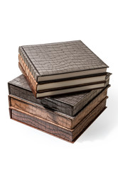 hardcover books lying on a white background