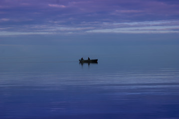 fishermen on the horizon