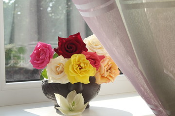 a bouquet of colorful roses