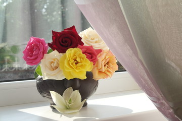 a bouquet of colorful roses