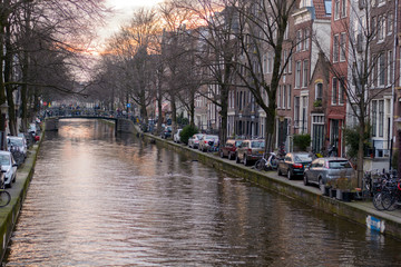 Fototapeta premium Walking in the street in Amsterdam, Holland