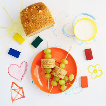 Lunch For Kids With Wooden Skewers With Peanut Butter, Toast And Grapes