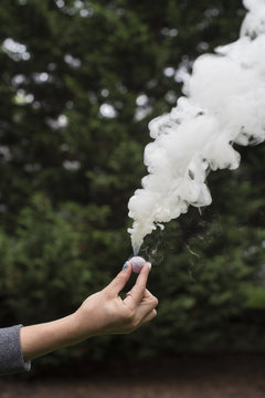 Hand holding firecracker